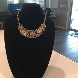 Gold tone necklace